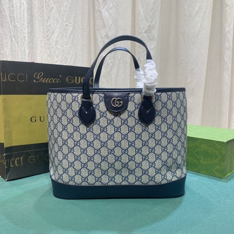 G*u*i shopping bags